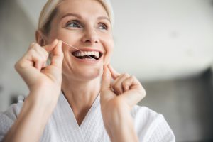 woman flossing